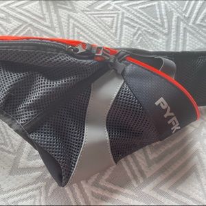 Running PYFX running belt bag. Never used. Great shape.